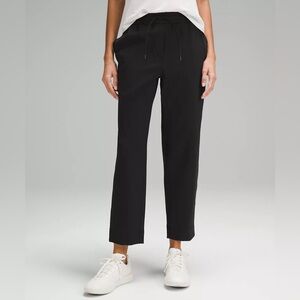 Lululemon black straight leg trouser; size 12; $75